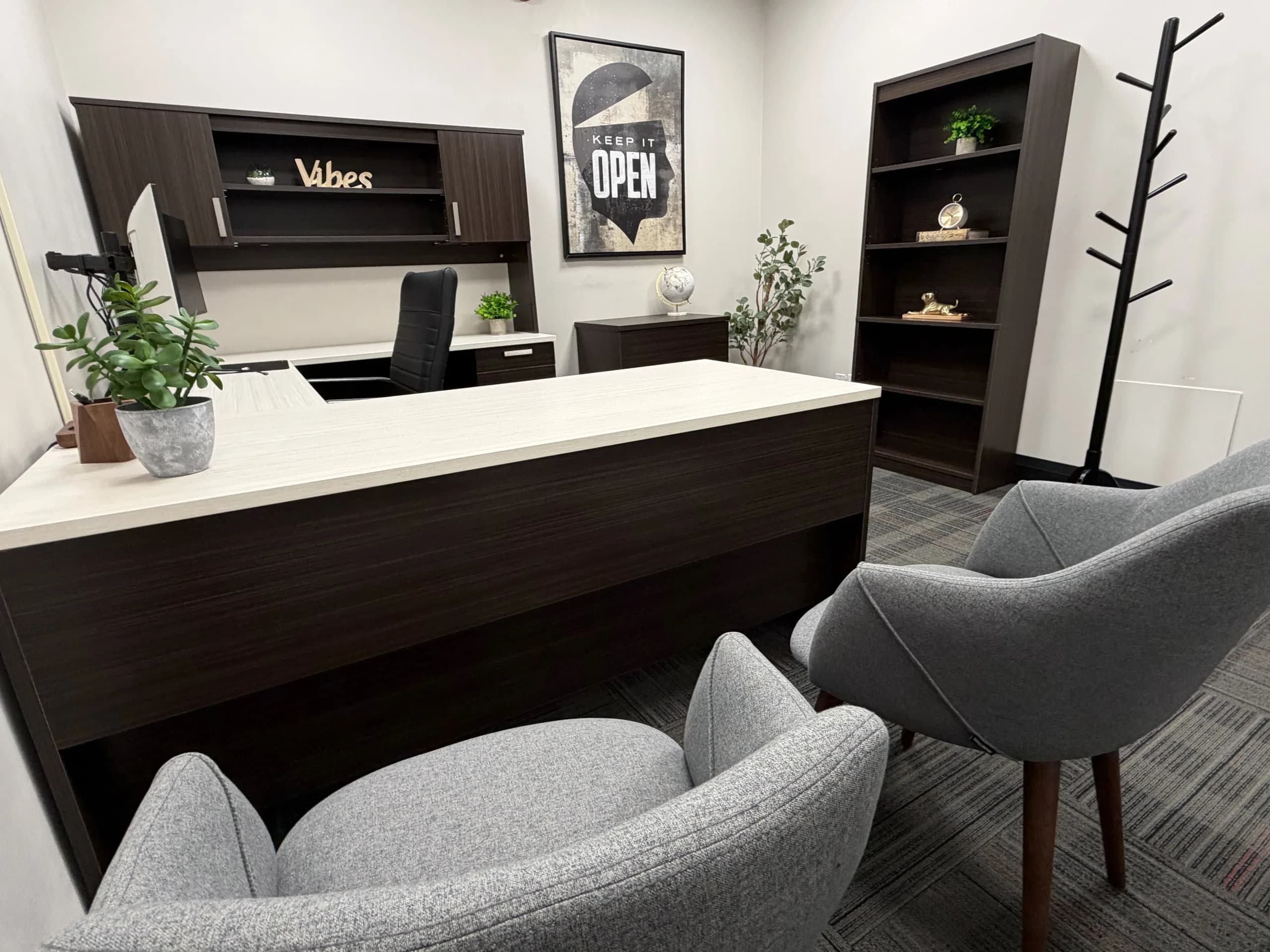A private office at The Creator Lounge with a Keep it Open art print